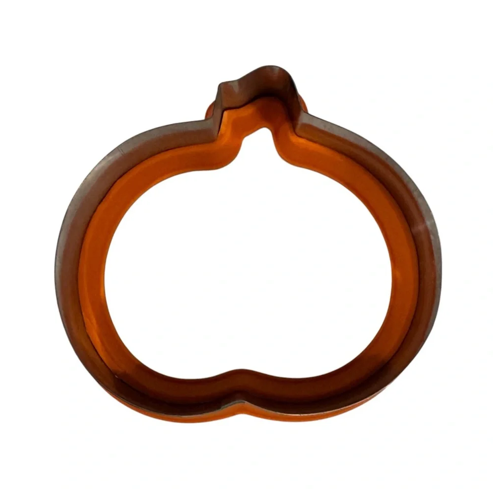 Williams Sonoma pumpkin cookie cutter metal with orange rubber coating